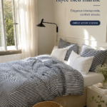 Parure de lit bleu navy rayé sur un lit élégant