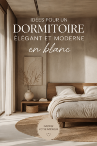 Chambre élégante et moderne décorée principalement en blanc.