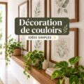 Couloir décoré avec des plantes et des œuvres d'art, créant une atmosphère accueillante