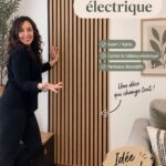 Un salon élégant avec des luminaires habillés de tissus colorés.
